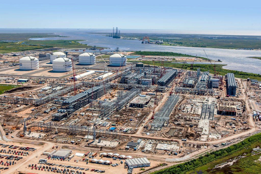 ON THE HORIZON: The price of oil is critical to the question that looms over the outlook: How many of the LNG projects will actually go vertical? Pictured: Cheniere Energy’s Sabine Pass LNG plant under construction. (Photo courtesy Cheniere Energy)